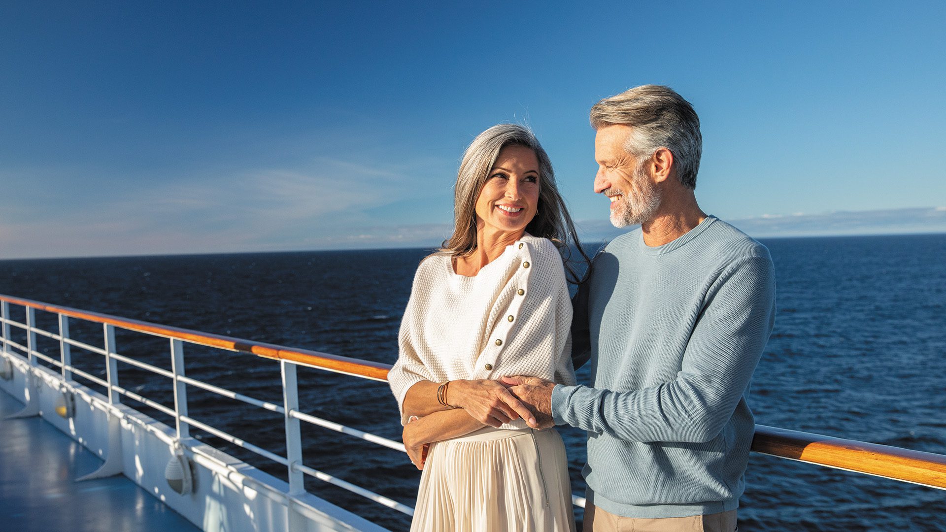 Regent Couple on Railing of Navigator